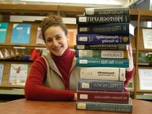 Student with pile of books